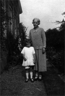 This is one of Alice (Baker) Grubham's sisters Ada M. Baker with Winnie.