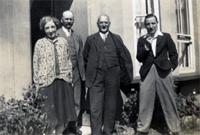 Emma L. (Baker) Ireland, George Ireland, Mr Johnson and Ken. At Clacton.