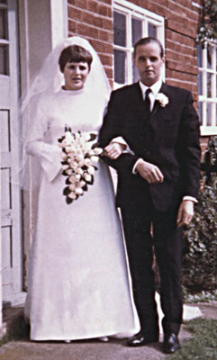 Margaret and her father, outsde their house at Broadwas, before the marriage ceremony.