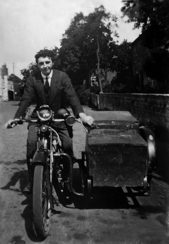 Francis Cuthbert Jones - posing on motorbike with sidecar.